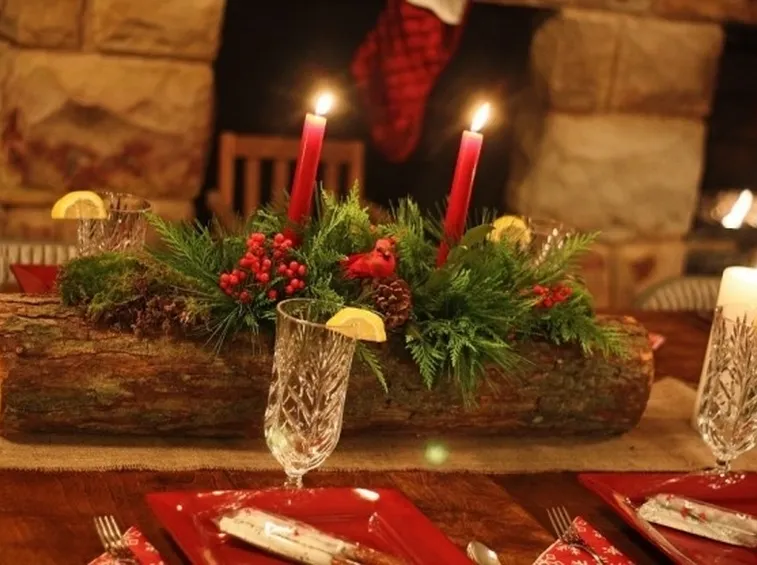 Centrotavola con candele realizzato da un fiorista