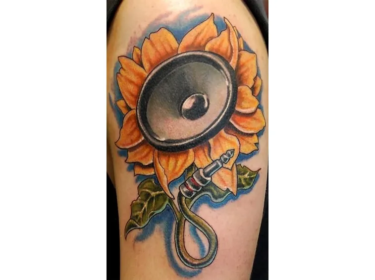 Un girasole stilizzato il cui capolino è sostituito da una cassa per la musica