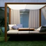 Un gazebo può trasformarsi in un comodo letto, nel più puro stile dell'arredamento moderno